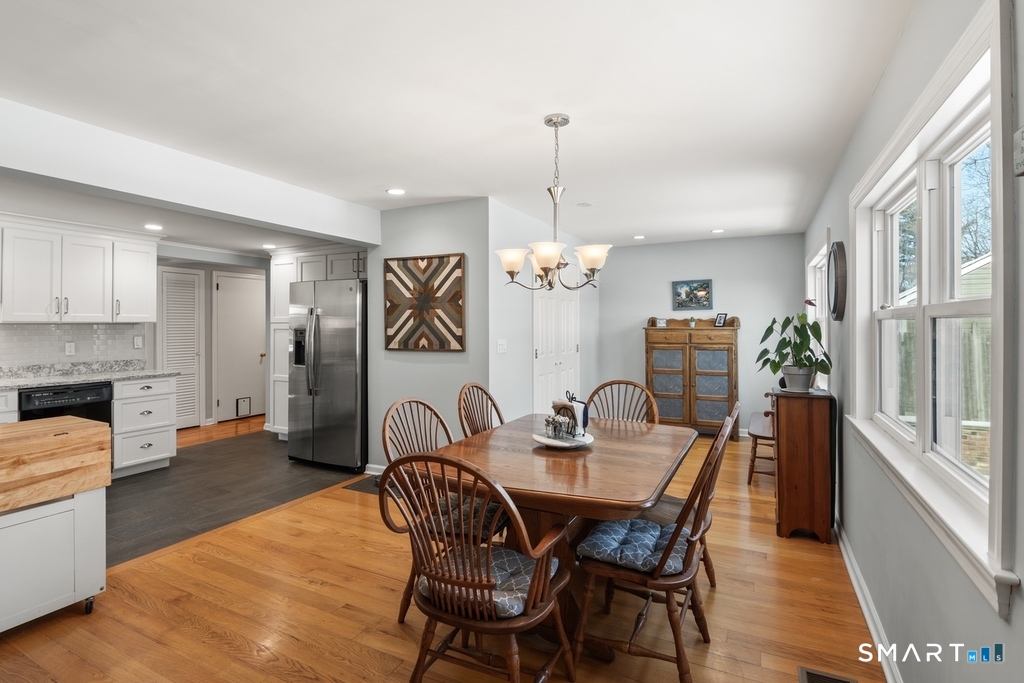 49 Minivale Road Stamford, CT 06907 - Photo 8 of 30 Bright light shows off hardwood floors. Laundry located off Dining Area.