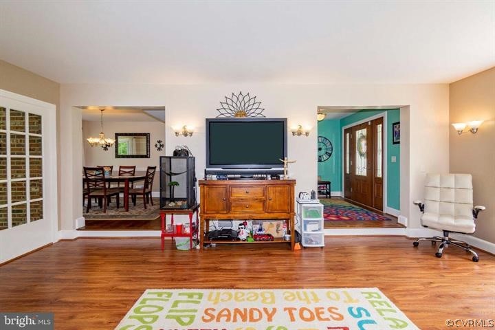 2400 Butler Road Beaverdam, VA 23015 - Photo 13 of 46 a living room with furniture and a flat screen tv