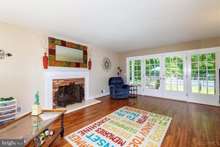 2400 Butler Road Beaverdam, VA 23015 - Photo 14 of 46 a living room with furniture and a fireplace
