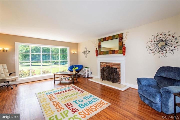 2400 Butler Road Beaverdam, VA 23015 - Photo 15 of 46 a living room with furniture and a fireplace
