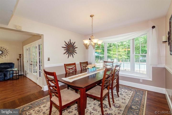 2400 Butler Road Beaverdam, VA 23015 - Photo 17 of 46 a view of a dining room with furniture window and wooden floor