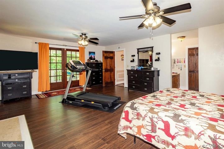 2400 Butler Road Beaverdam, VA 23015 - Photo 25 of 46 a bedroom with a bed and a flat screen tv