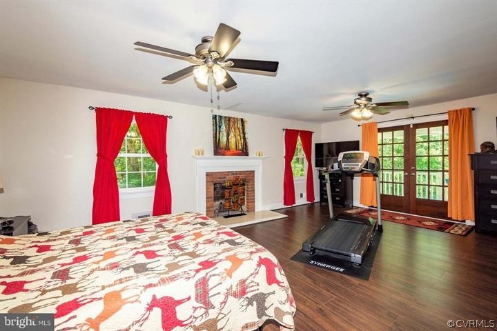 2400 Butler Road Beaverdam, VA 23015 - Photo 26 of 46 a bedroom with a bed and a chandelier