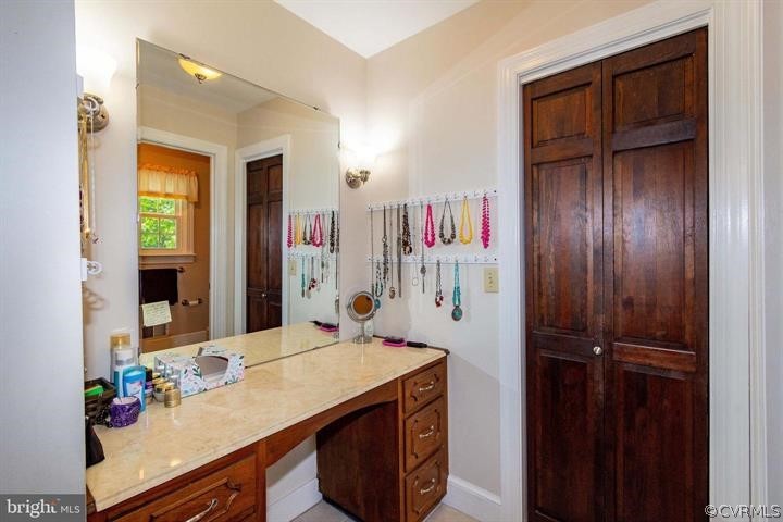 2400 Butler Road Beaverdam, VA 23015 - Photo 27 of 46 a bathroom with a sink vanity and a mirror