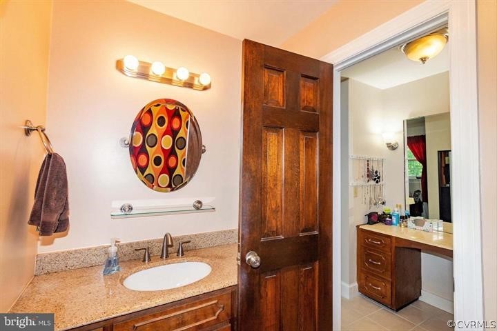 2400 Butler Road Beaverdam, VA 23015 - Photo 30 of 46 a bathroom with a sink and a mirror