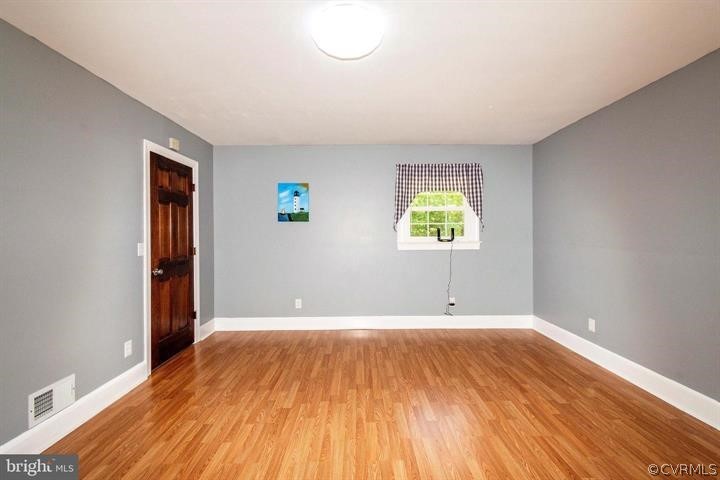 2400 Butler Road Beaverdam, VA 23015 - Photo 34 of 46 wooden floor in an empty room with window