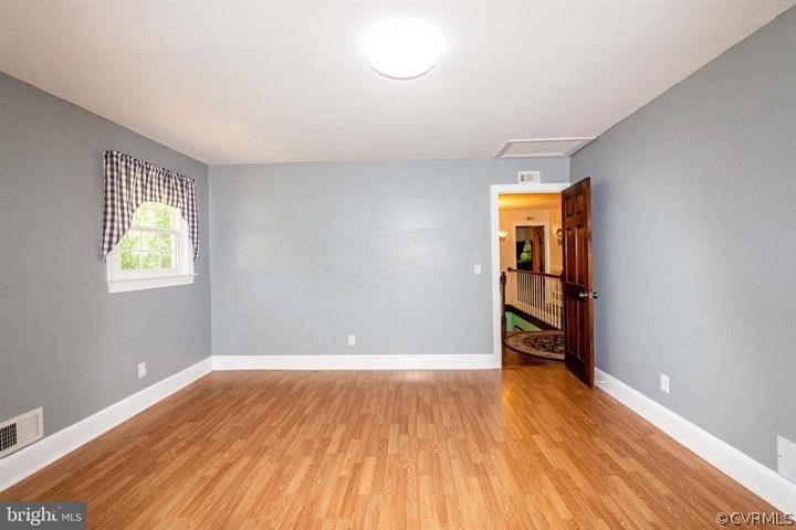 2400 Butler Road Beaverdam, VA 23015 - Photo 35 of 46 an empty room with wooden floor and closet