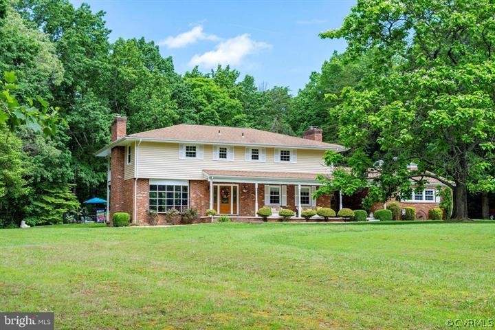 2400 Butler Road Beaverdam, VA 23015 - Photo 40 of 46 a front view of a house with a yard