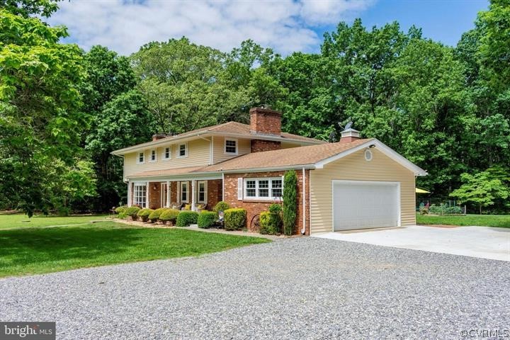 2400 Butler Road Beaverdam, VA 23015 - Photo 41 of 46 a front view of a house with garden