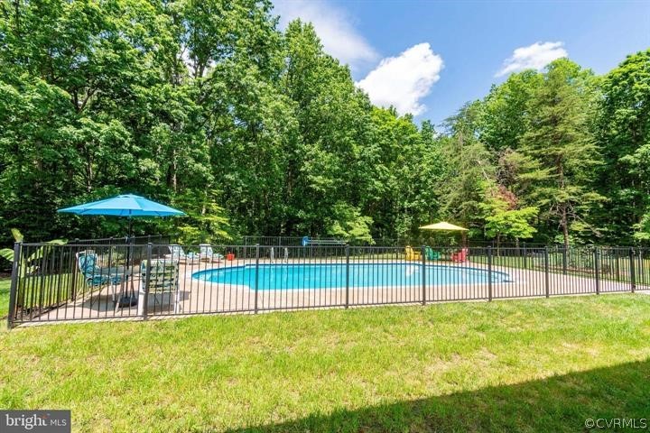 2400 Butler Road Beaverdam, VA 23015 - Photo 45 of 46 a view of a backyard with a garden and entertaining space