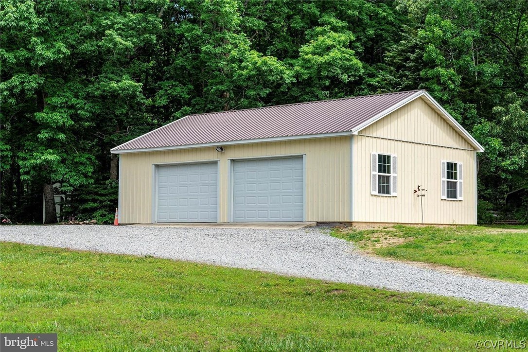 2400 Butler Road Beaverdam, VA 23015 - Photo 5 of 46 a front view of house with yard and trees all around