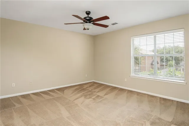 a bathroom with a tub and a sink