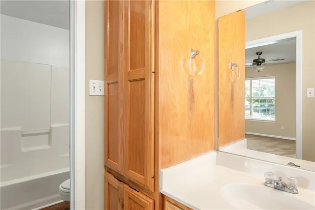 a view of a house with a yard and a garden