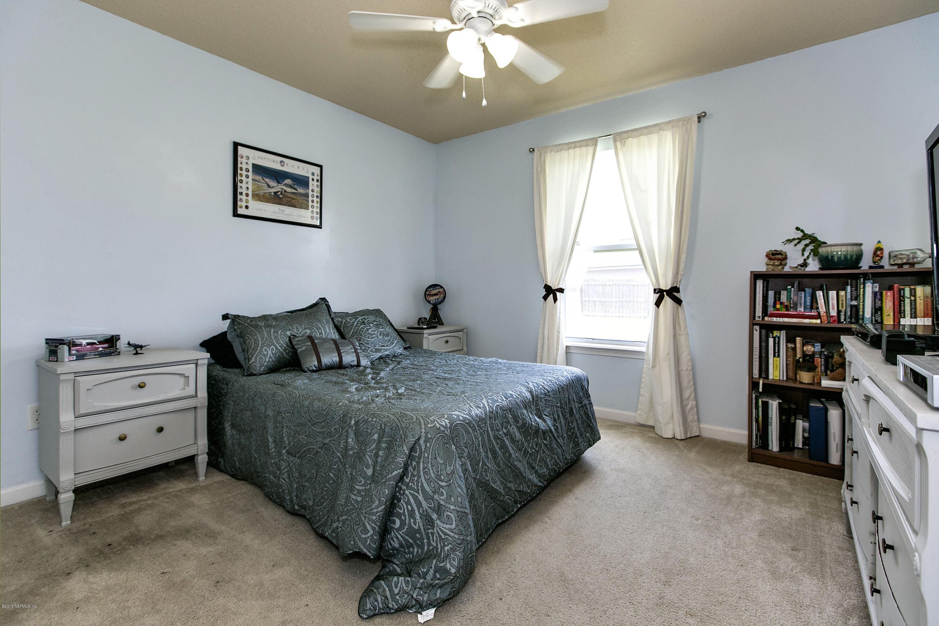 11765 Crooked River Road Jacksonville, FL 32219 - Photo 14 of 25 014_Bedroom