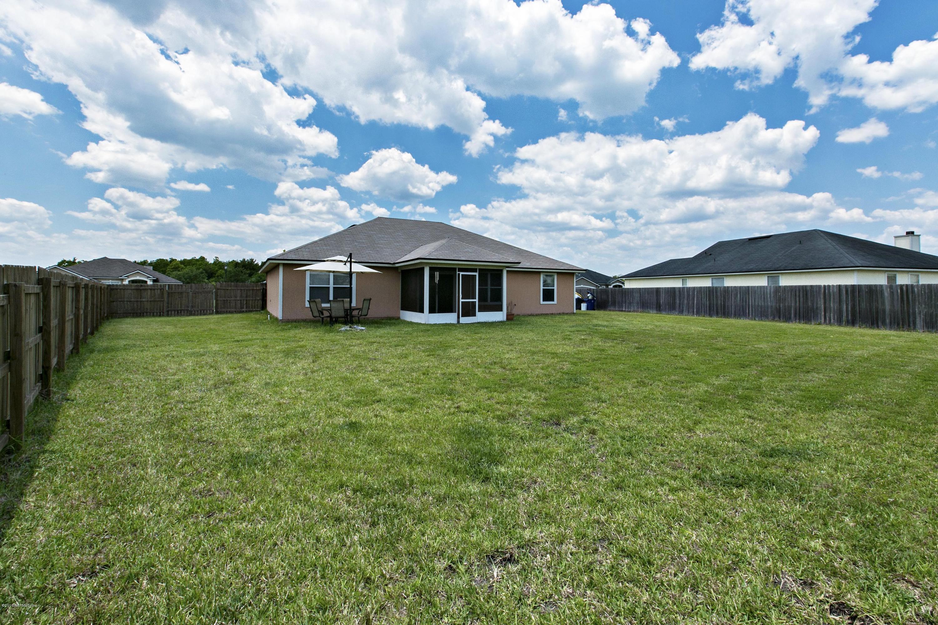 11765 Crooked River Road Jacksonville, FL 32219 - Photo 20 of 25 020_Exterior Back