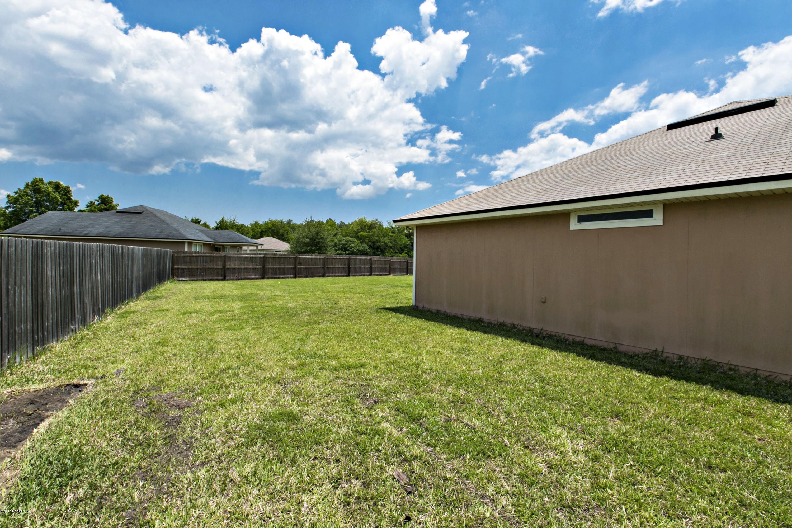 11765 Crooked River Road Jacksonville, FL 32219 - Photo 22 of 25 022_Side Yard