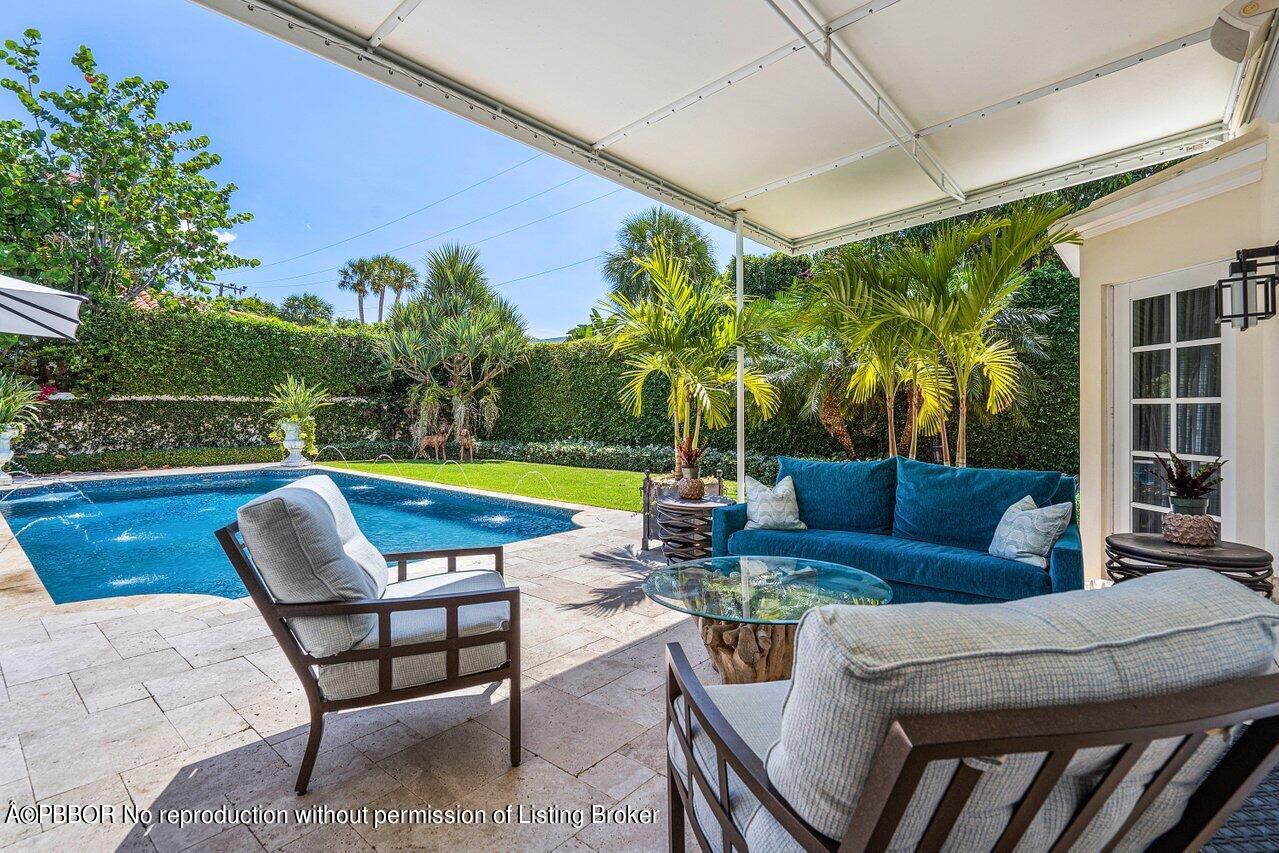 168 Kings Road Palm Beach, FL 33480 - Photo 25 of 30 a swimming pool with outdoor seating and yard