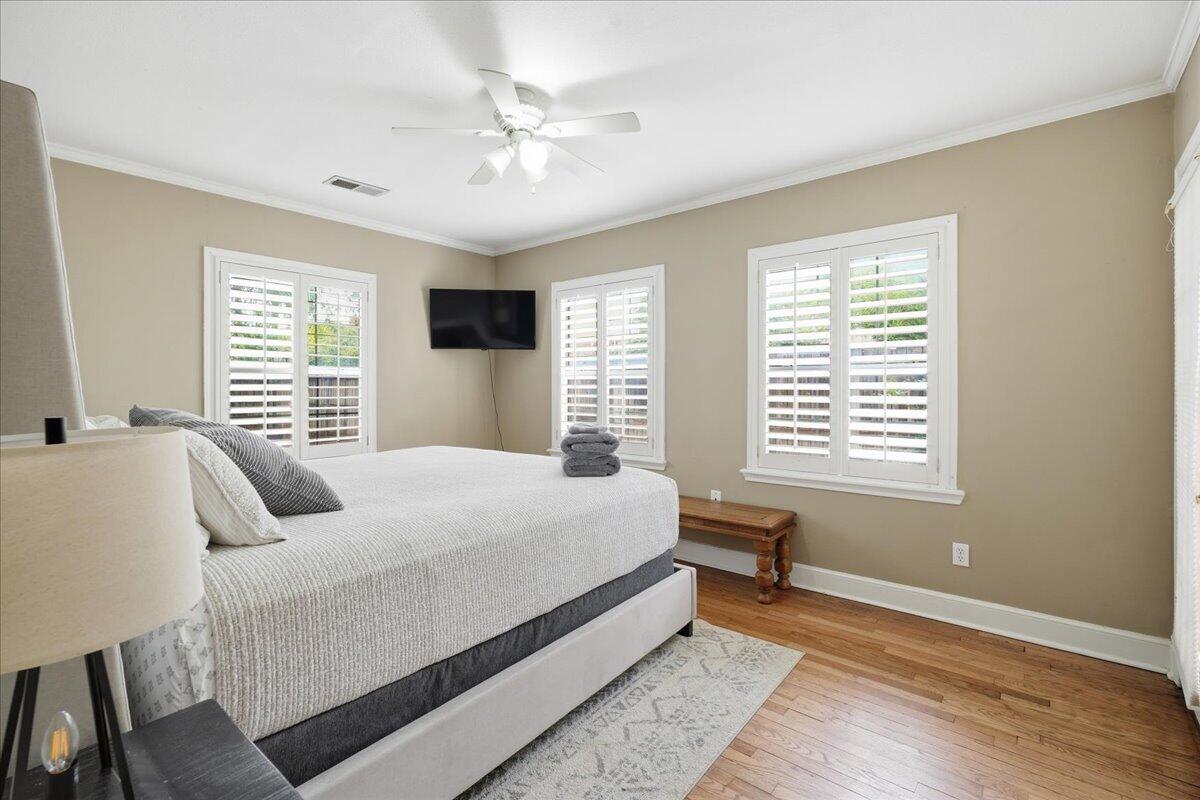 2702 20th Street Lubbock, TX 79410 - Photo 18 of 34 a bedroom with a bed and window