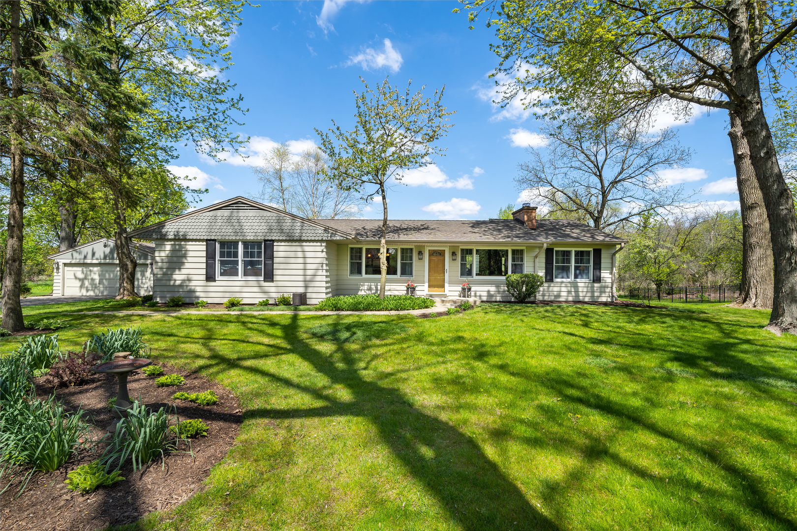 43W640 Thornapple Tree Road Sugar Grove, IL 60554 - Photo 1 of 32 a front view of a house with a yard