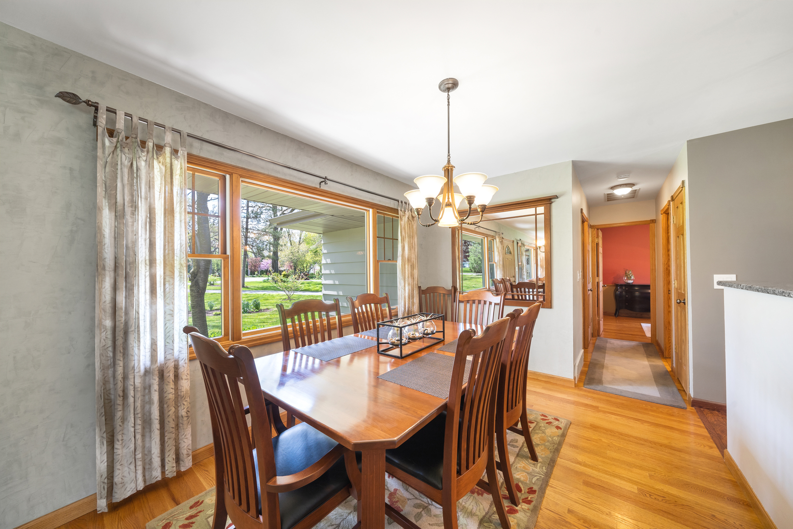 43W640 Thornapple Tree Road Sugar Grove, IL 60554 - Photo 8 of 32 a view of a dining room with furniture window and wooden floor