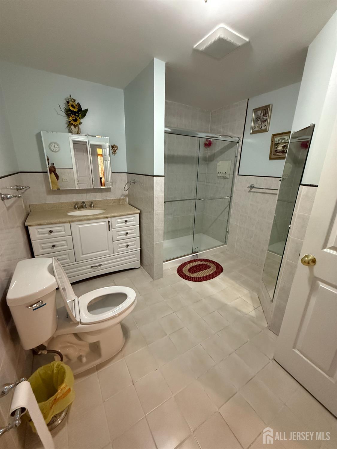 31 Beverly Street, Unit 2ND F Carteret, NJ 07008 - Photo 13 of 20 a bathroom with a toilet and a shower