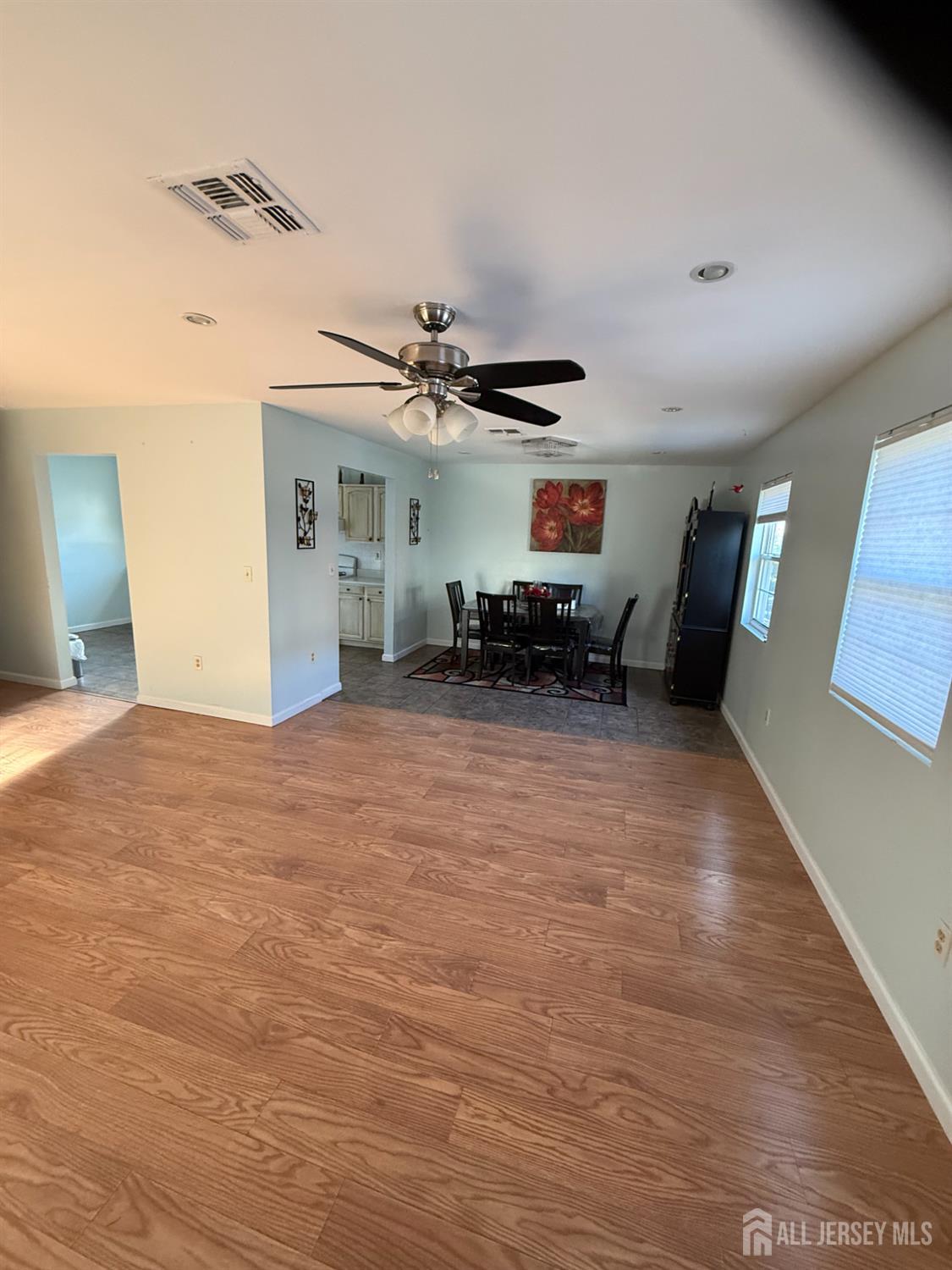 31 Beverly Street, Unit 2ND F Carteret, NJ 07008 - Photo 3 of 20 a view of a livingroom with furniture and a ceiling fan