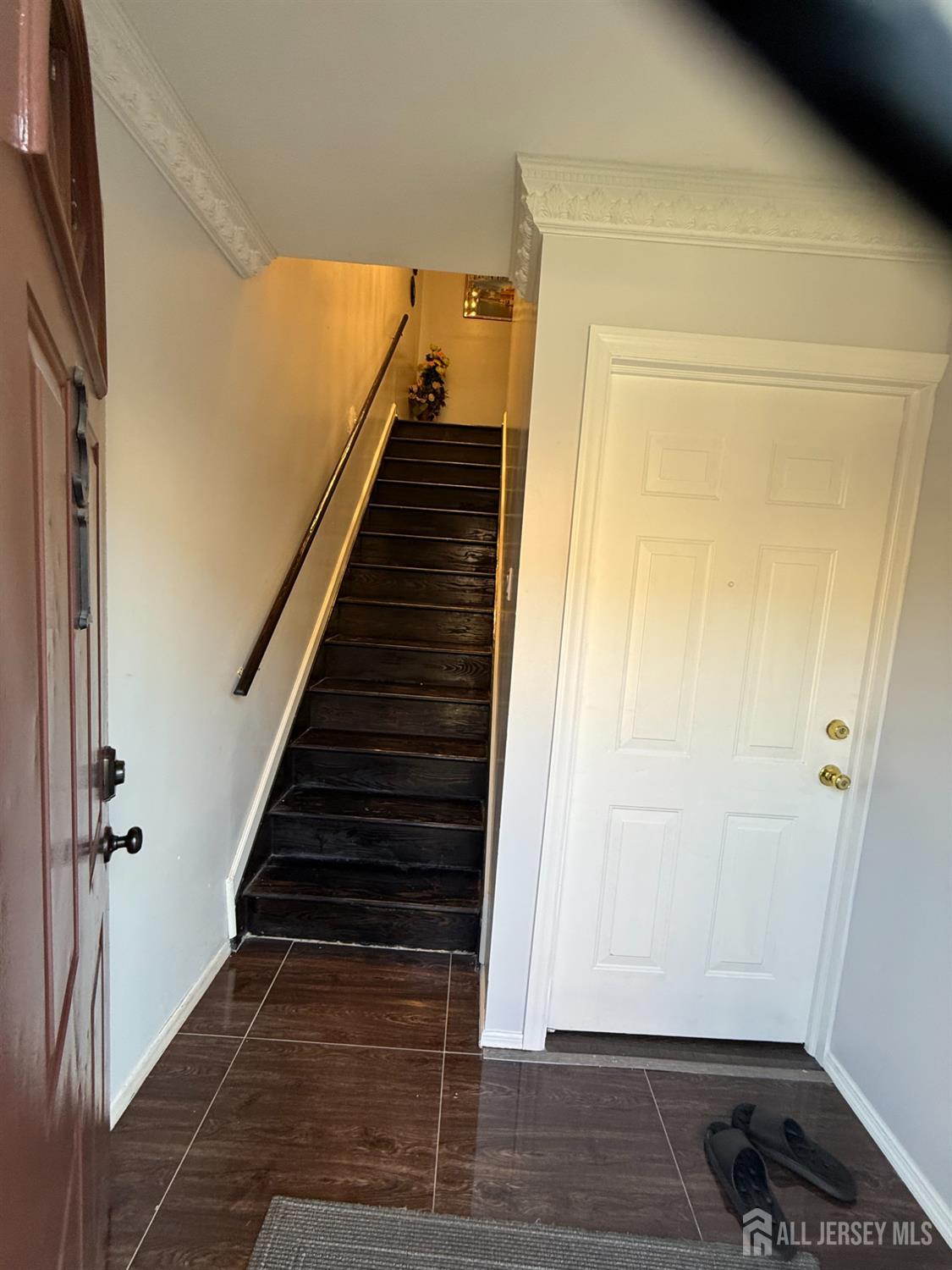 31 Beverly Street, Unit 2ND F Carteret, NJ 07008 - Photo 5 of 20 a view of entryway and hall with wooden floor