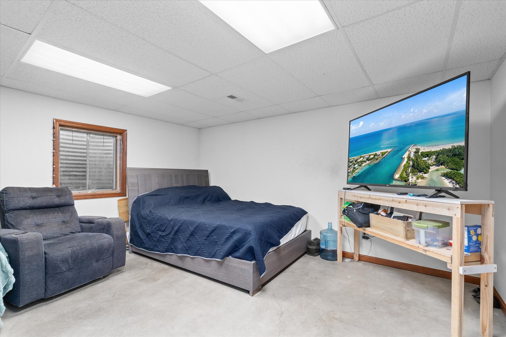 4461 Highway 23 Leland, IL 60531 - Photo 17 of 28 a living room with a couch and a window
