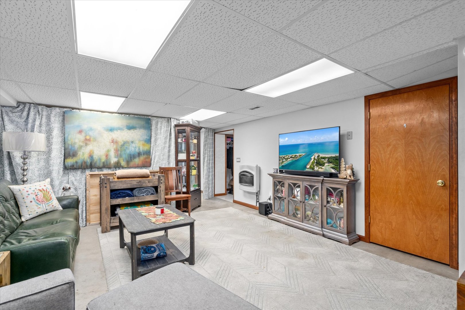 4461 Highway 23 Leland, IL 60531 - Photo 21 of 28 a living room with furniture and a flat screen tv
