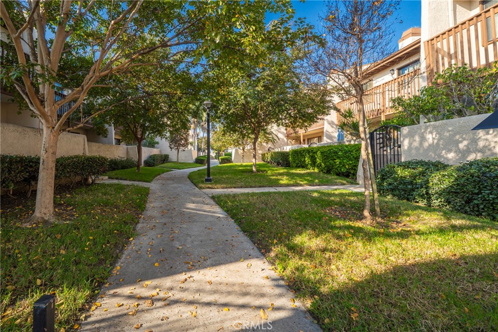 10663 Bell Street Stanton, CA 90680 - Photo 2 of 38 a view of a yard with plants and trees