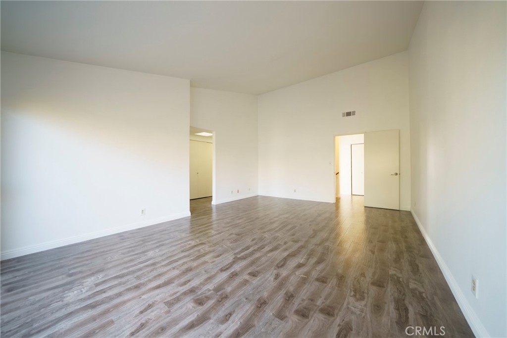 10663 Bell Street Stanton, CA 90680 - Photo 24 of 38 a view of an empty room and wooden floor