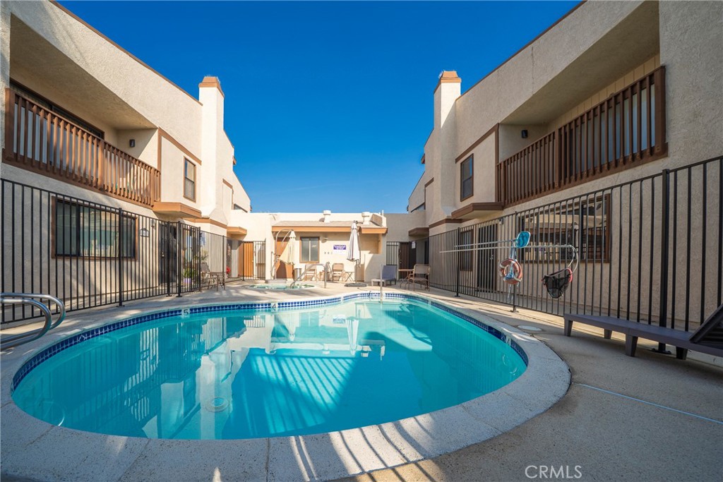 10663 Bell Street Stanton, CA 90680 - Photo 34 of 38 a view of a house with pool and sitting area