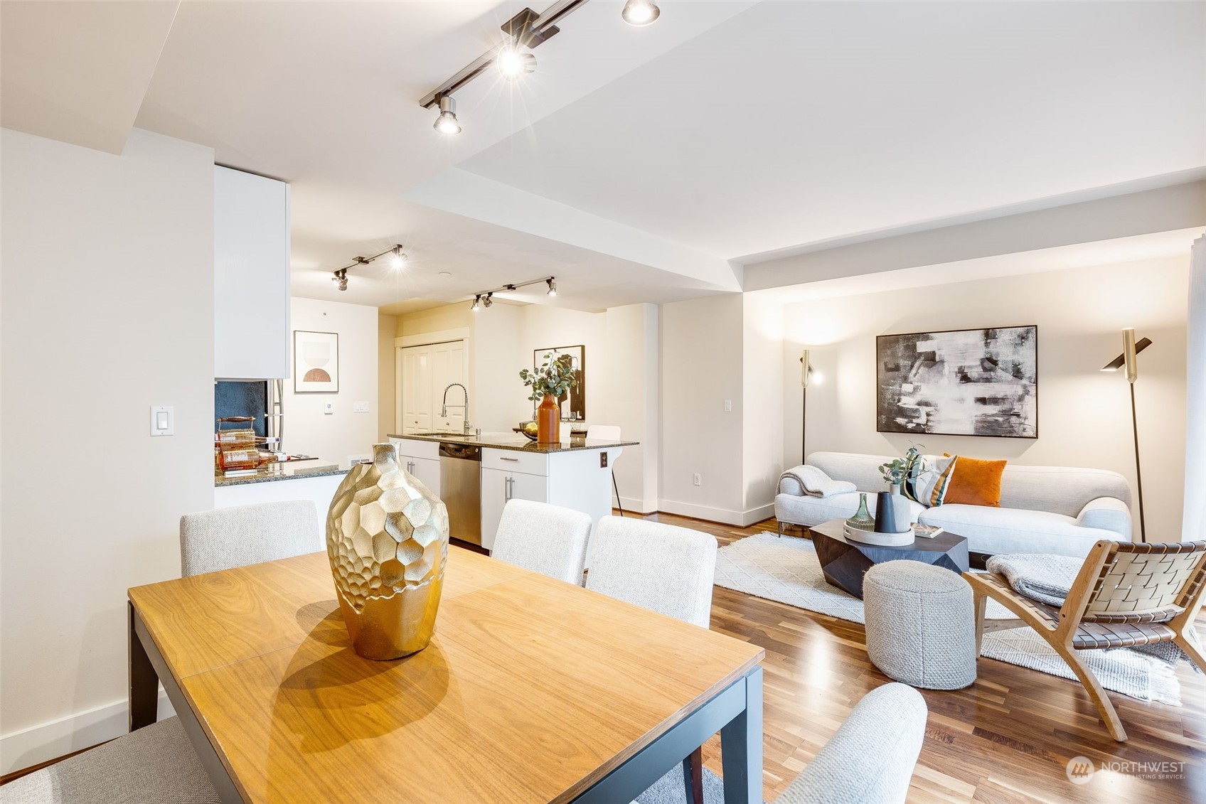 699 John Street, Unit 209 Seattle, WA 98109 - Photo 11 of 28 a living room with furniture and wooden floor