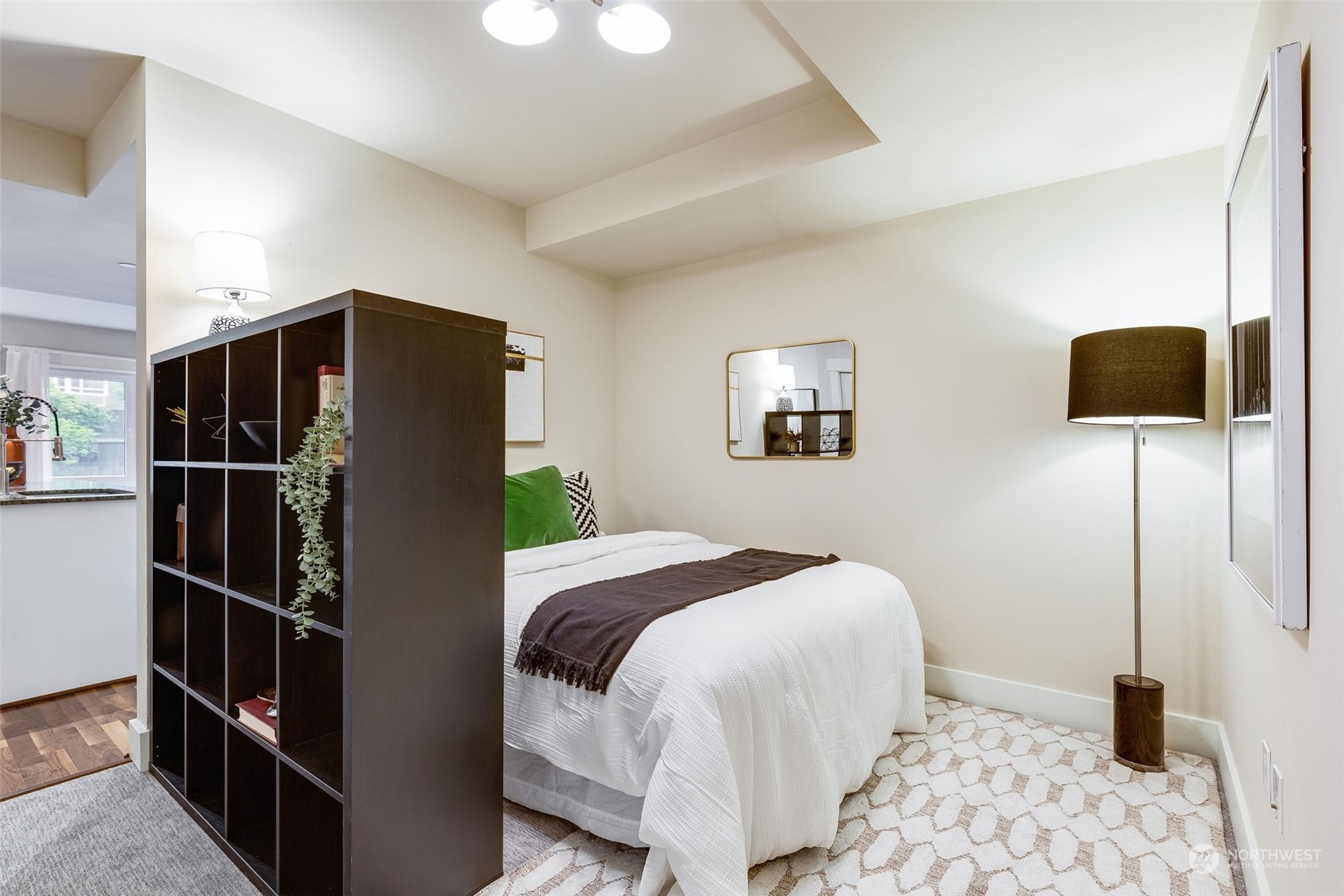 699 John Street, Unit 209 Seattle, WA 98109 - Photo 15 of 28 a bedroom with a bed and a window