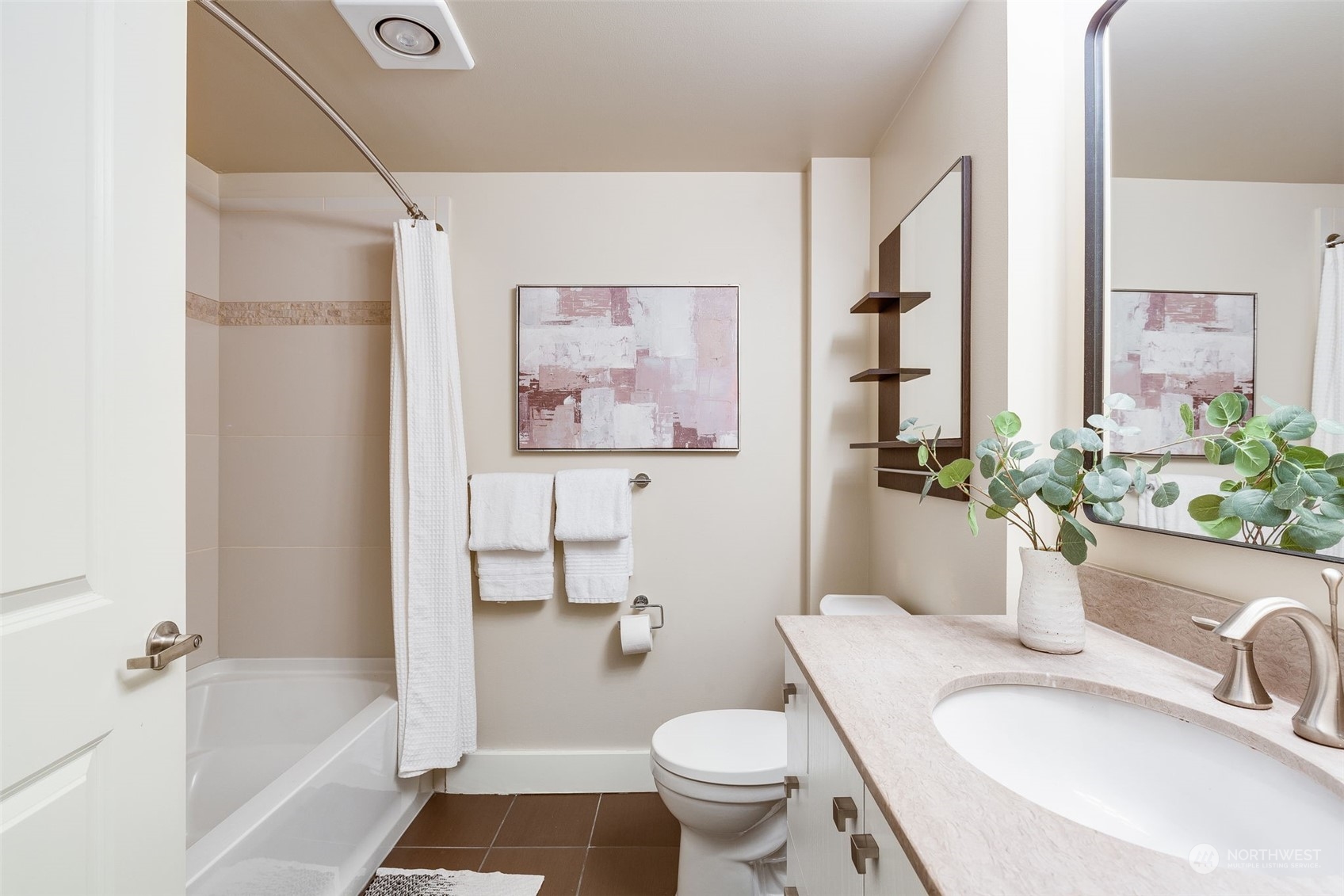 699 John Street, Unit 209 Seattle, WA 98109 - Photo 17 of 28 a bathroom with a sink toilet and shower