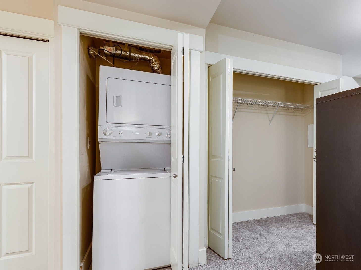 699 John Street, Unit 209 Seattle, WA 98109 - Photo 19 of 28 a utility room with washing machine