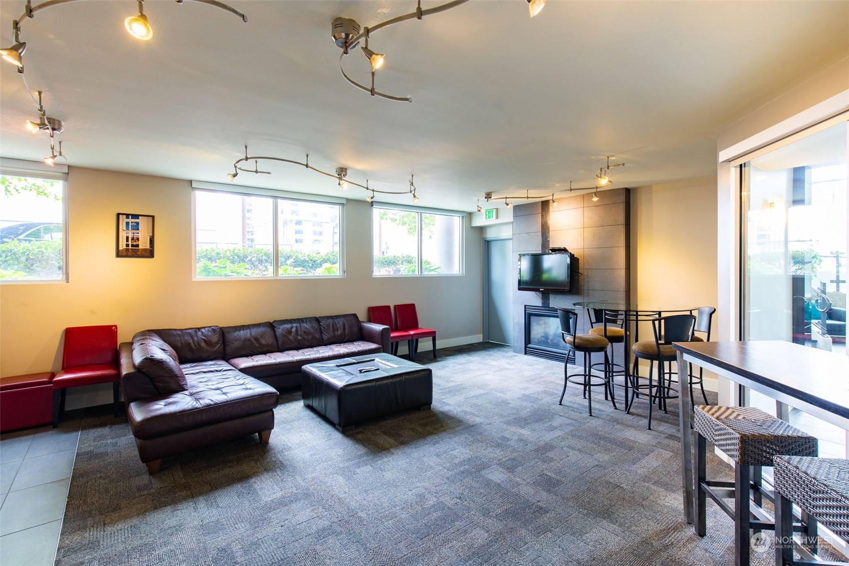 699 John Street, Unit 209 Seattle, WA 98109 - Photo 24 of 28 a living room with furniture and a window