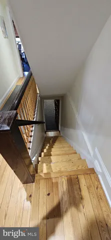 a view of a swimming pool with furniture