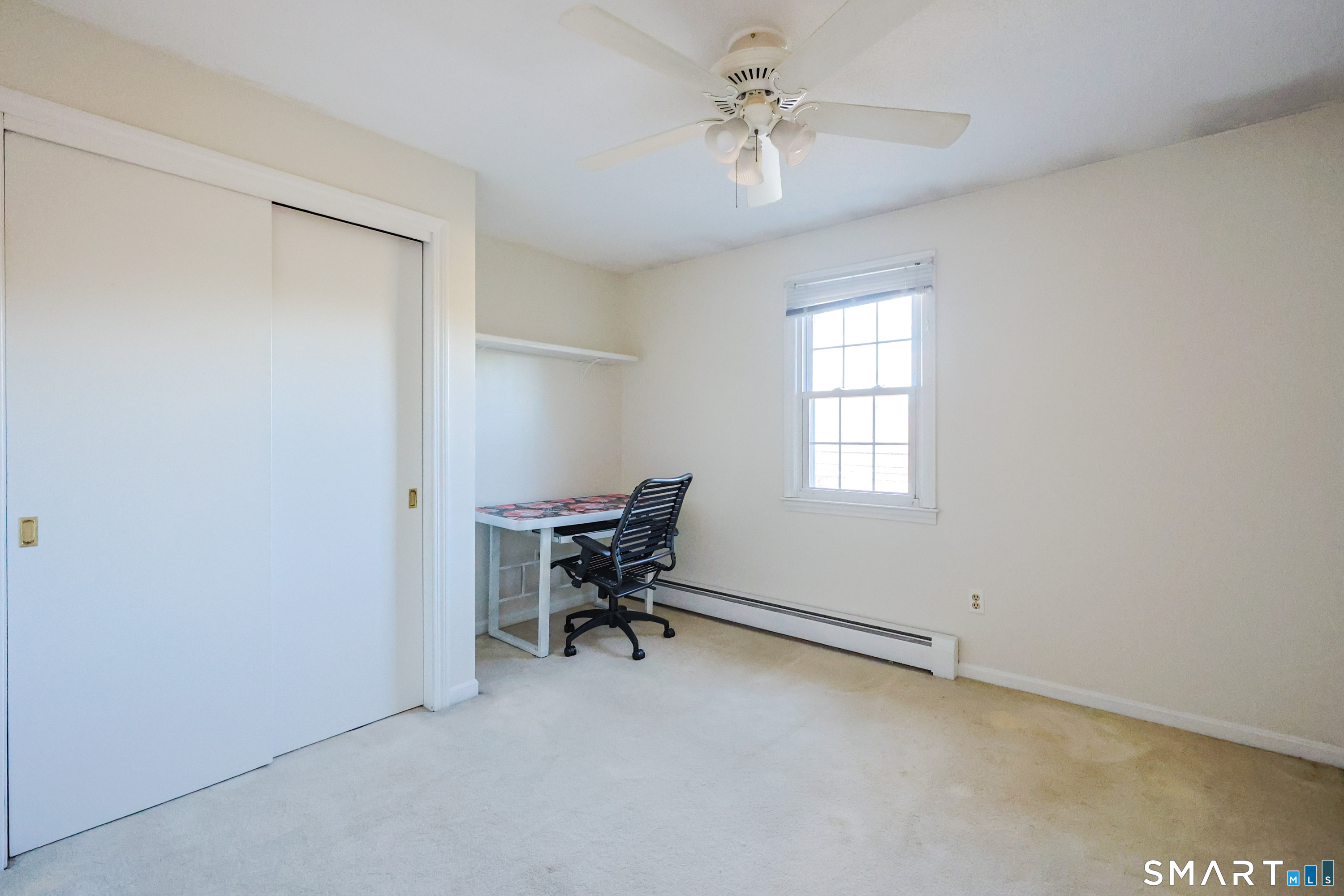 80 Sabin Street Putnam, CT 06260 - Photo 20 of 26 a view of workspace with a window