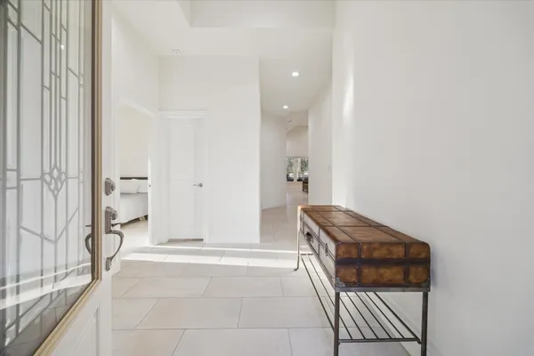 a bathroom with a tub and shower
