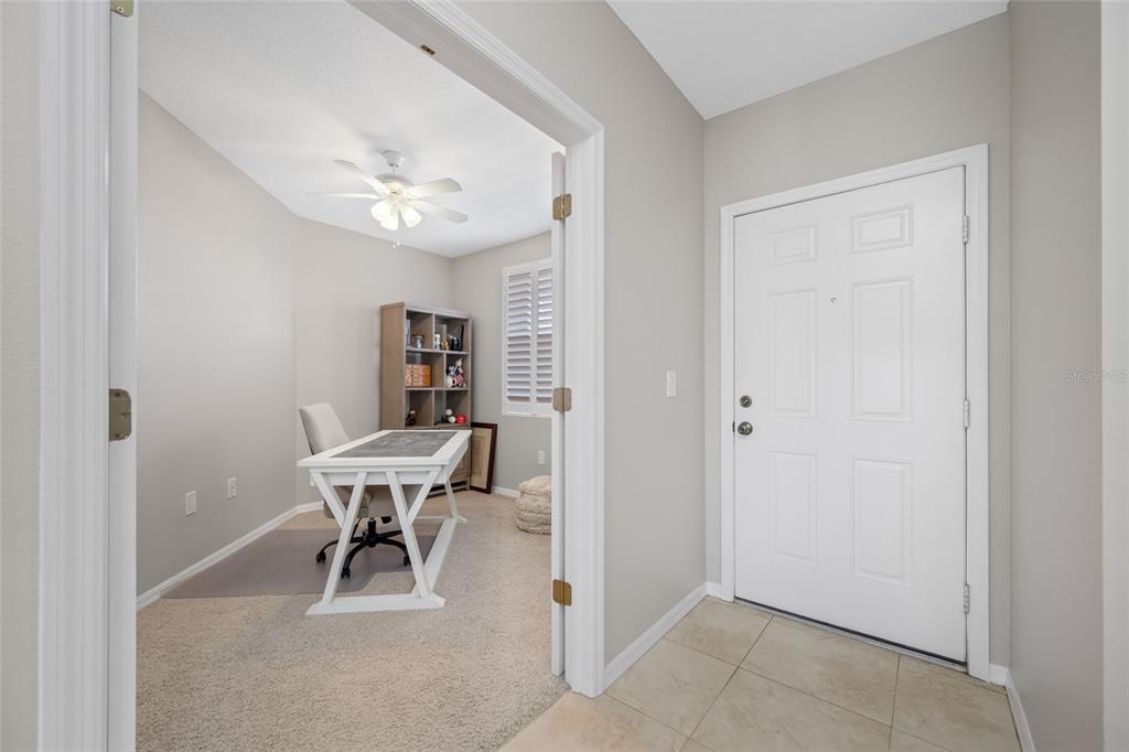 960 Starkey Road, Unit 5504 Largo, FL 33771 - Photo 14 of 46 a view of a dining room with furniture