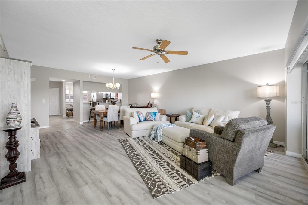 960 Starkey Road, Unit 5504 Largo, FL 33771 - Photo 33 of 46 a living room with furniture and view of kitchen