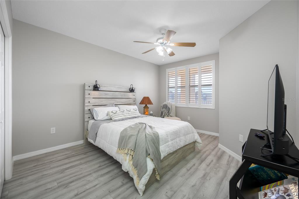 960 Starkey Road, Unit 5504 Largo, FL 33771 - Photo 36 of 46 a bed room with a bed and a window