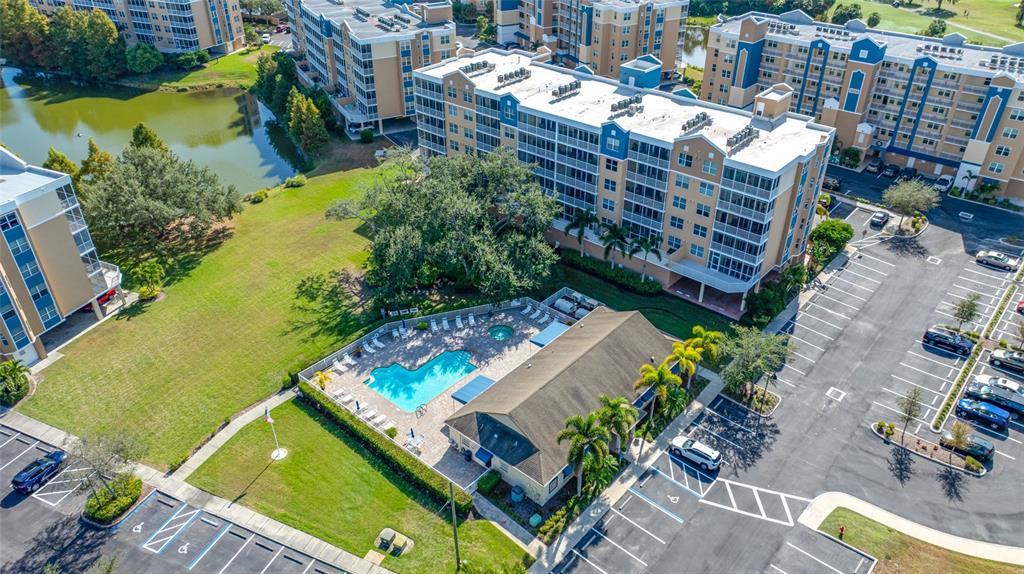 960 Starkey Road, Unit 5504 Largo, FL 33771 - Photo 39 of 46 an aerial view of a residential apartment building with a yard