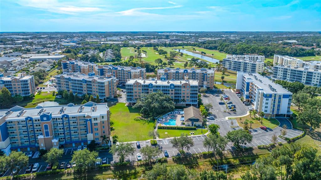 960 Starkey Road, Unit 5504 Largo, FL 33771 - Photo 45 of 46 an aerial view of residential building and lake