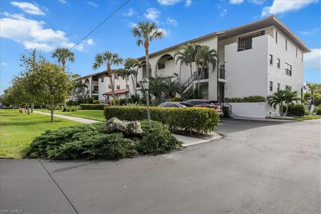 a view of a house with a garden