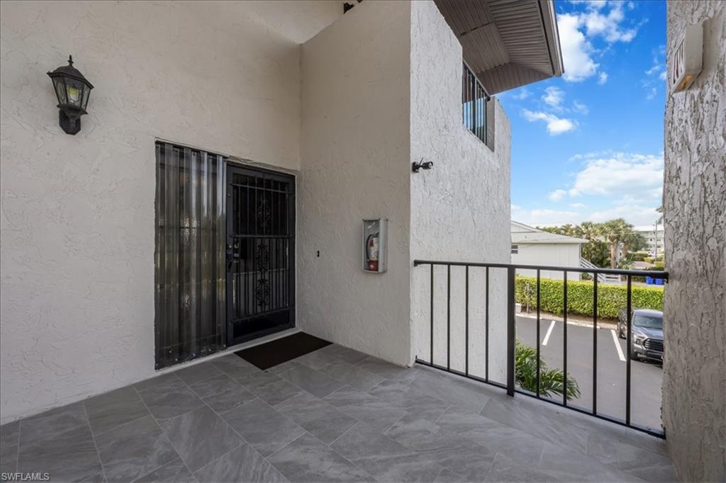 1400 Blue Point Avenue, Unit 208 Naples, FL 34102 - Photo 2 of 24 a view of balcony