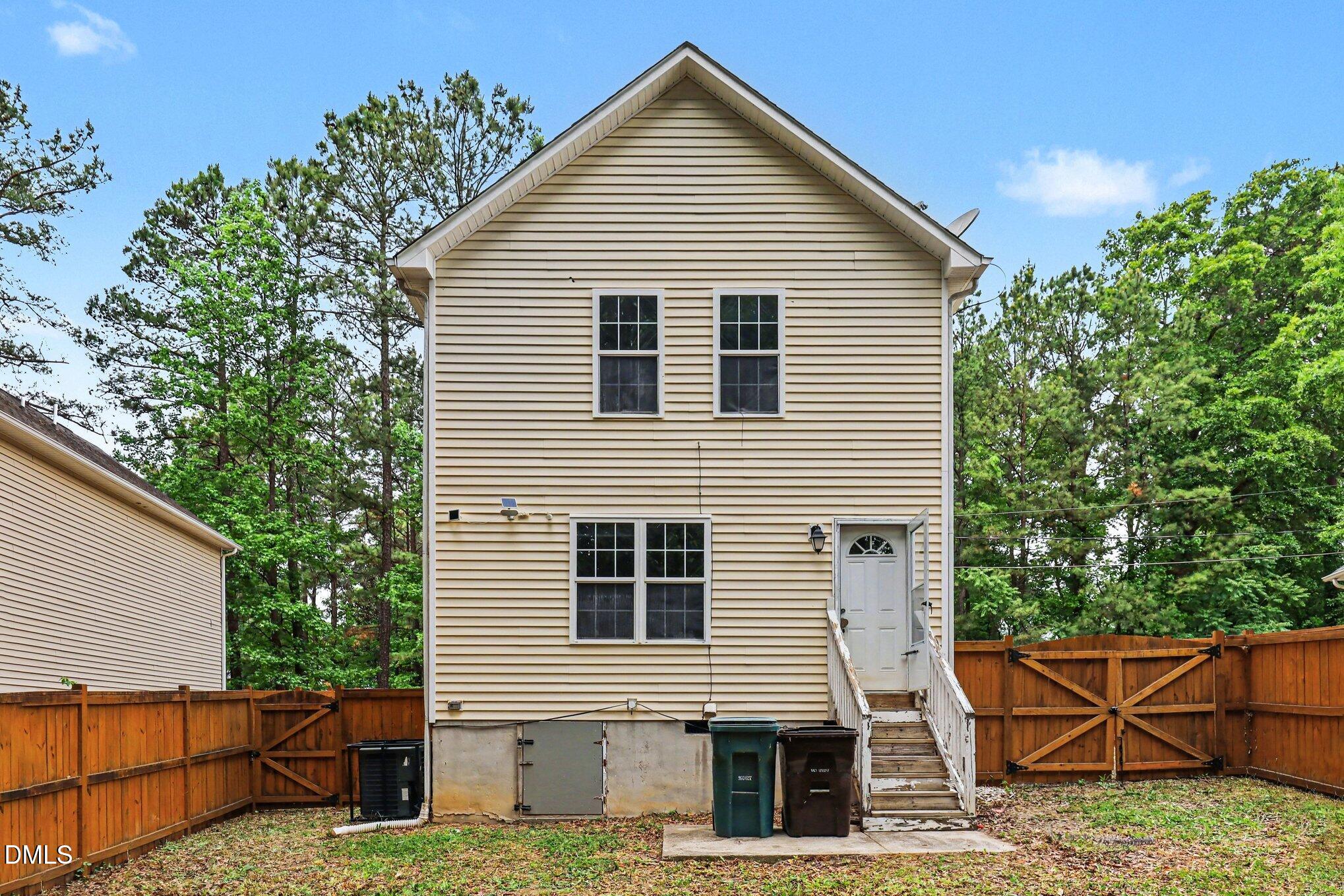 704 Brye Street Durham, NC 27703 - Photo 30 of 34 a view of a house with a yard