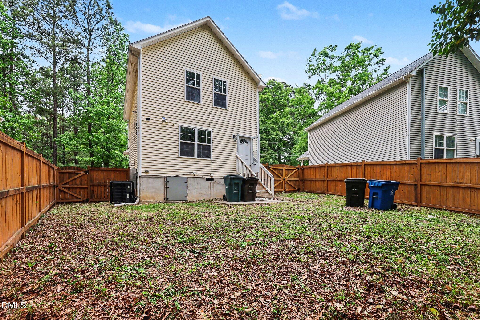 704 Brye Street Durham, NC 27703 - Photo 31 of 34 a view of a house with a yard