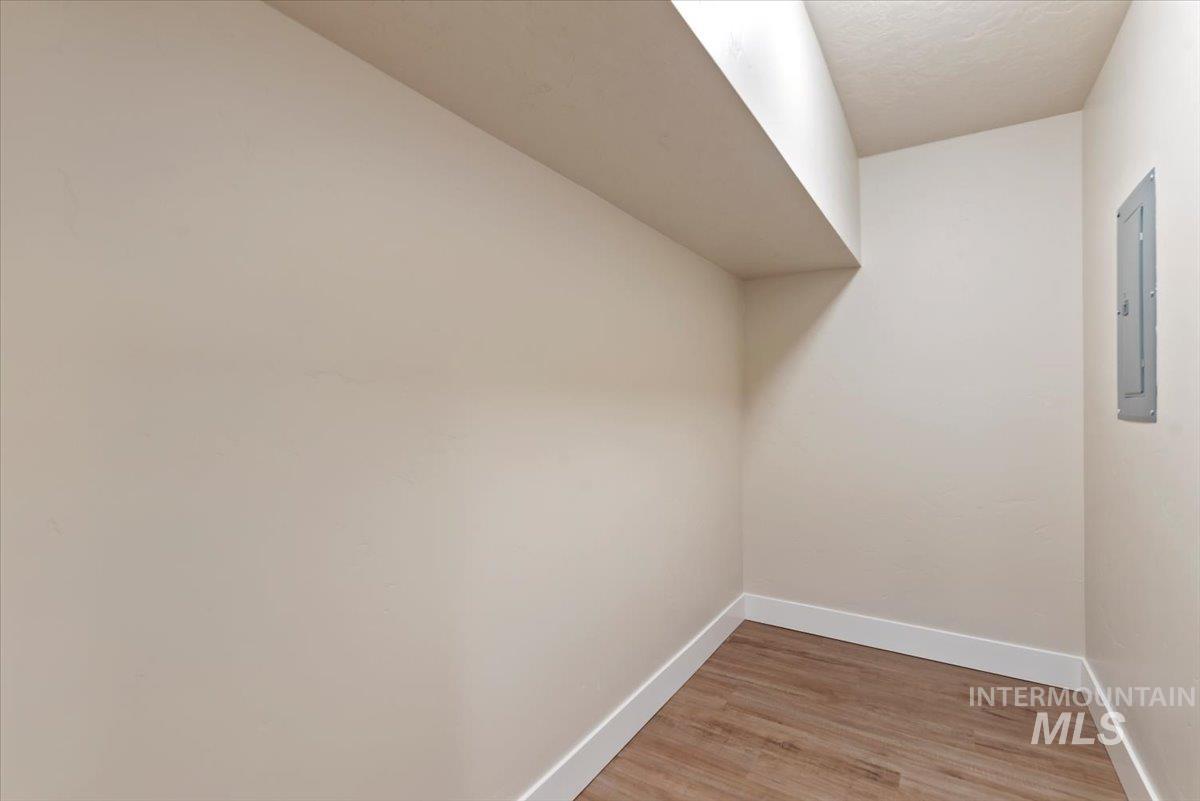 1300 Birch Street Parma, ID 83660 - Photo 17 of 24 Additional living space featuring light wood finished floors and electric panel